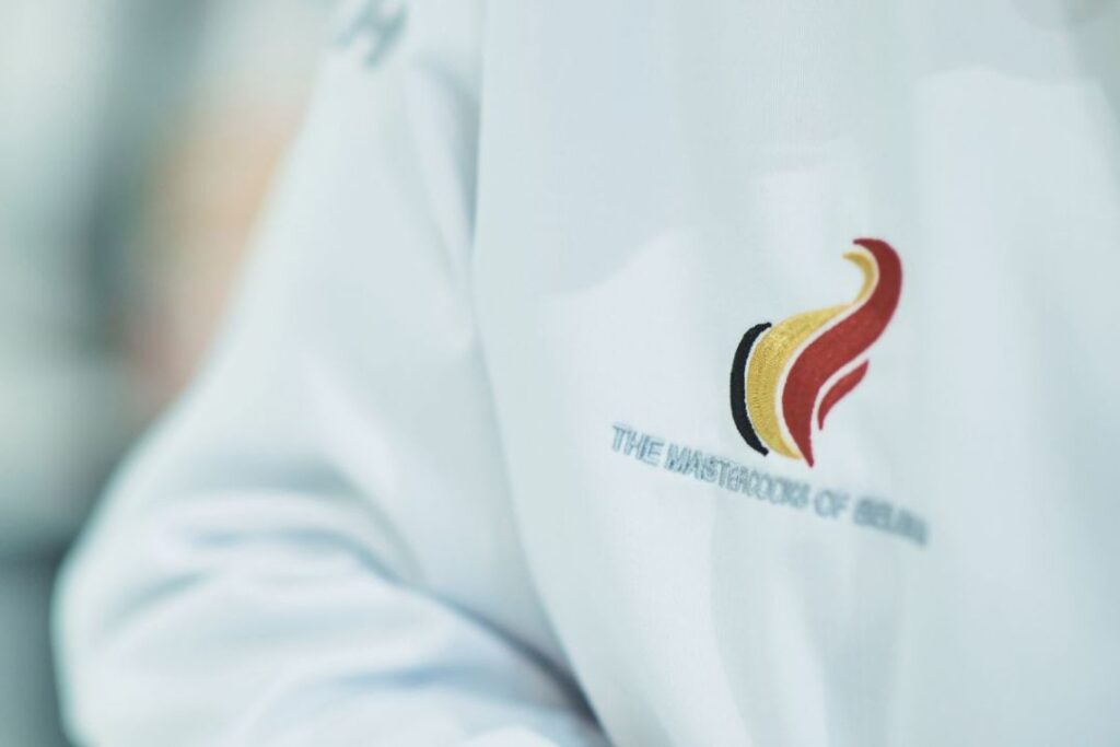 Das Logo der Mastercooks of Belgium auf der Jacke Linkaufbau HORECAwebzine